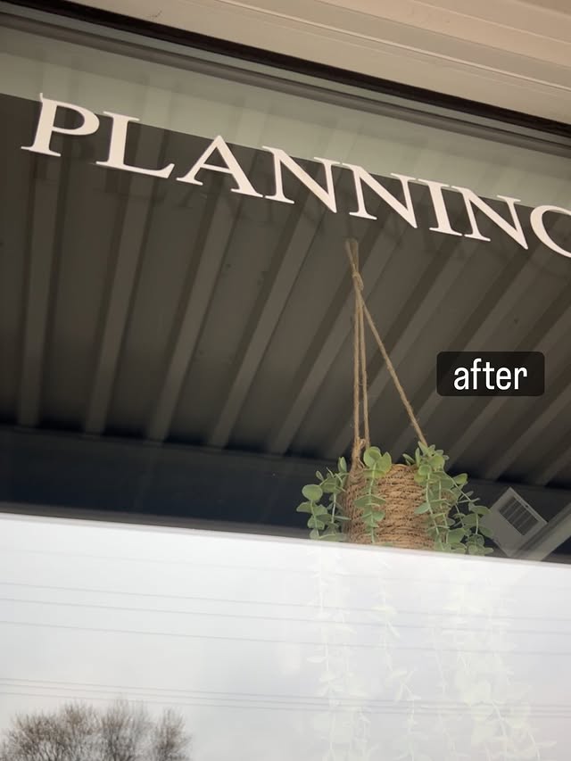 Same storefront window after cleaning — crystal clear glass